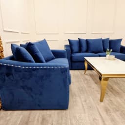 2 seater sofa with scatter cushion in living room
